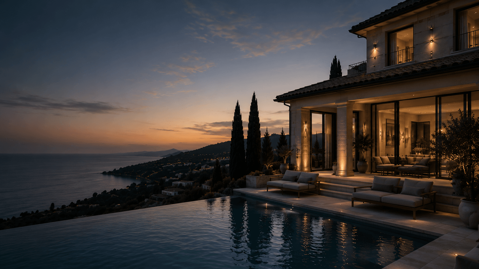 Illuminated luxury villa above the sea at dusk on the Costa del Sol